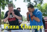 Pizza eating winners Kirk Taylor and Fred Olivas